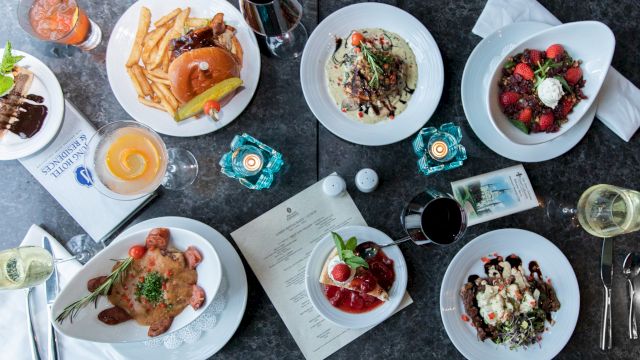 A table set with various dishes and drinks